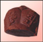 Made of coco powder with liquid chocolate inside.